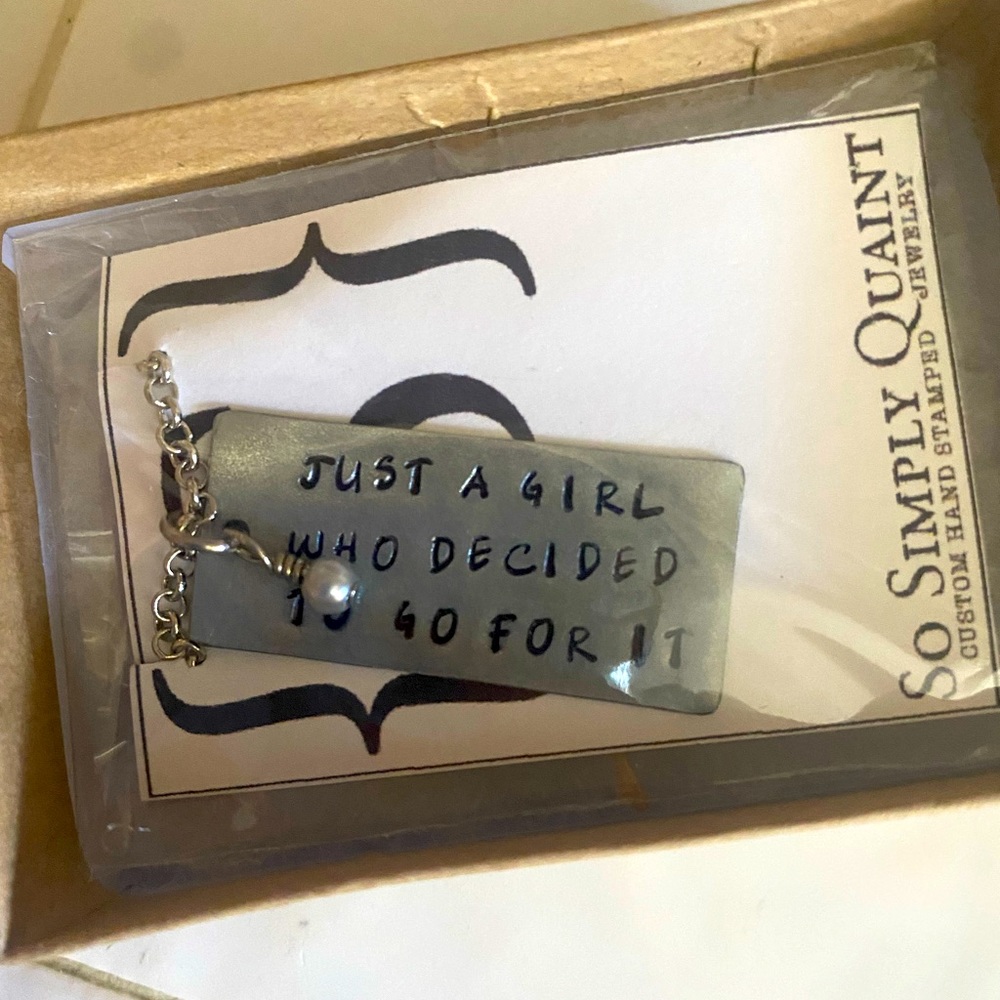 Custom made necklace, never ended up gifting it. Brand new in box